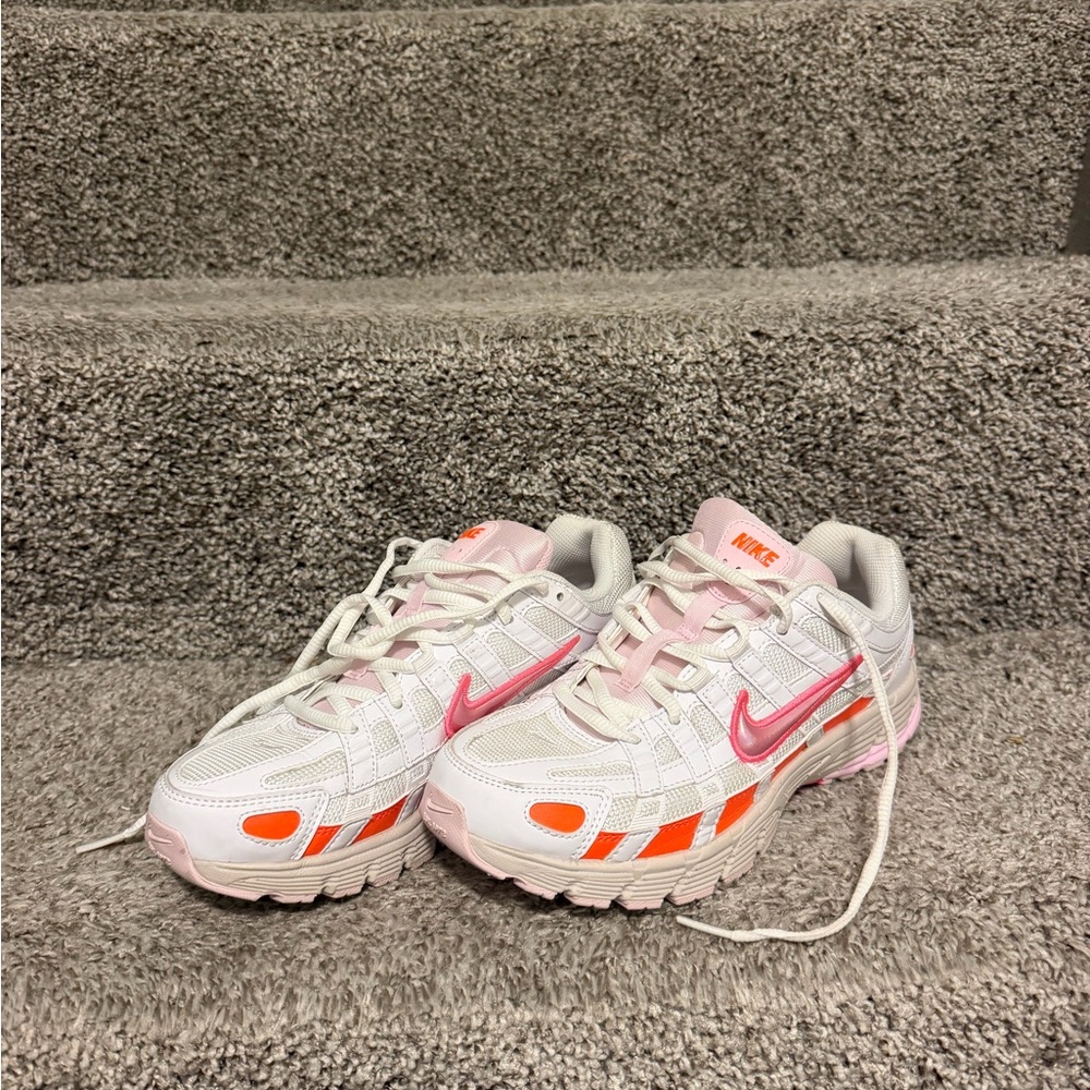 Nike White Sneakers with Pink Swoosh and Orange Accents